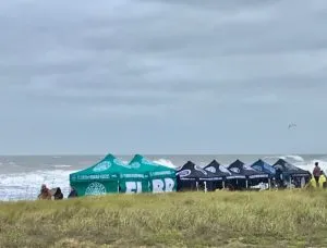 Flagler Surfers Bring The Heat Despite The Cold In Inaugural Competition 38 Tent on Beach | Accu-Temp Heating & Air Conditioning